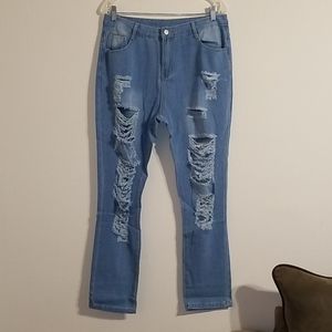 Light blue women's damaged distressed jeans